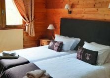 Twin bedroom in self catered Courchevel ski apartment